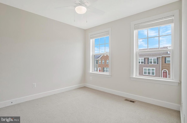 6911 Stansbury Ln, Landover, MD 20785 - unfurnished room featuring baseboards, carpet, and a ceiling fan