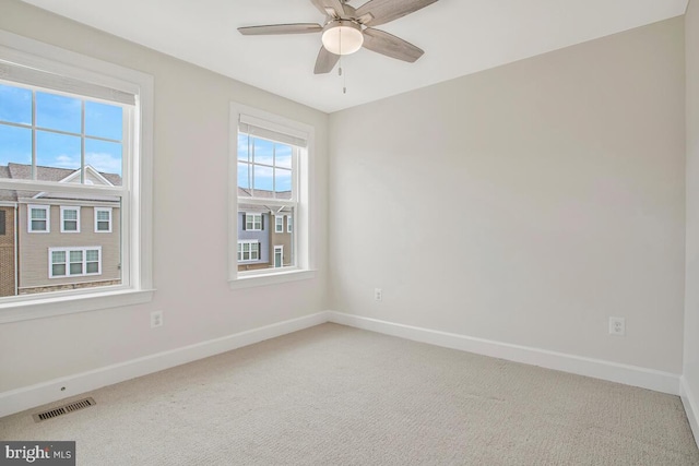 6911 Stansbury Ln, Landover, MD 20785 - unfurnished room featuring baseboards, carpet, and ceiling fan