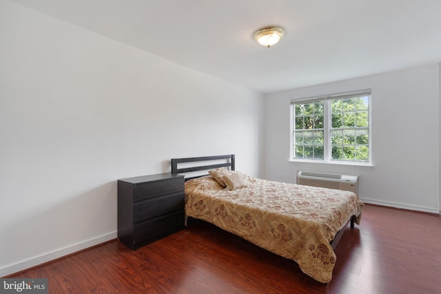 211 E Glebe Rd Unit C, Alexandria, VA 22305 - bedroom featuring dark wood finished floors, baseboards, and a wall mounted AC
