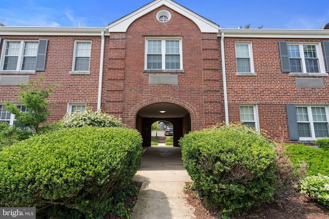 211 E Glebe Rd Unit C, Alexandria, VA 22305 - doorway to property featuring brick siding