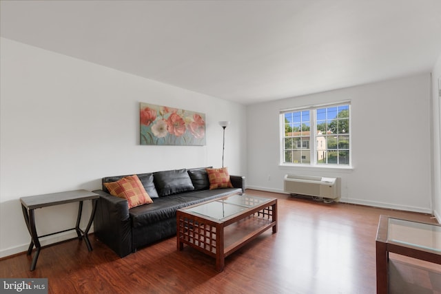 211 E Glebe Rd Unit C, Alexandria, VA 22305 - living area with wood finished floors, an AC wall unit, and baseboards