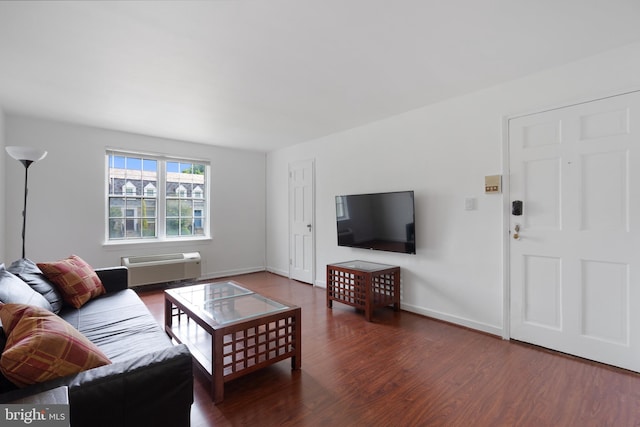 211 E Glebe Rd Unit C, Alexandria, VA 22305 - living area featuring wood finished floors, a wall mounted air conditioner, and baseboards
