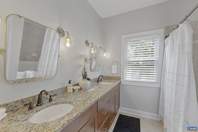 1012 Locust Ln, Charlottesville, VA 22901 - full bathroom featuring double vanity, baseboards, curtained shower, and tile patterned flooring