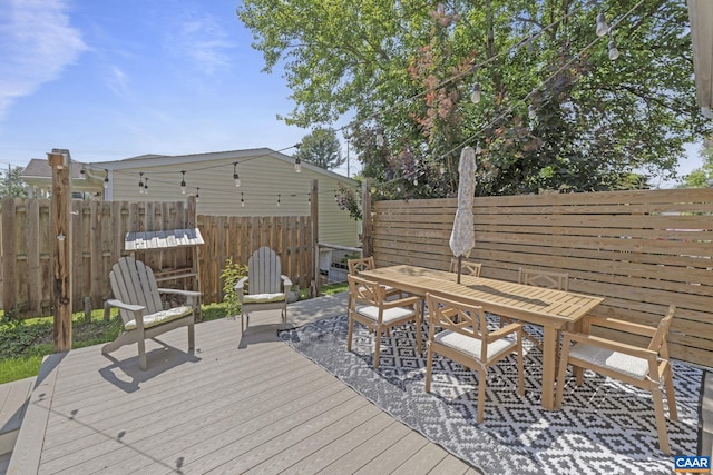 1012 Locust Ln, Charlottesville, VA 22901 - wooden deck featuring outdoor dining space
