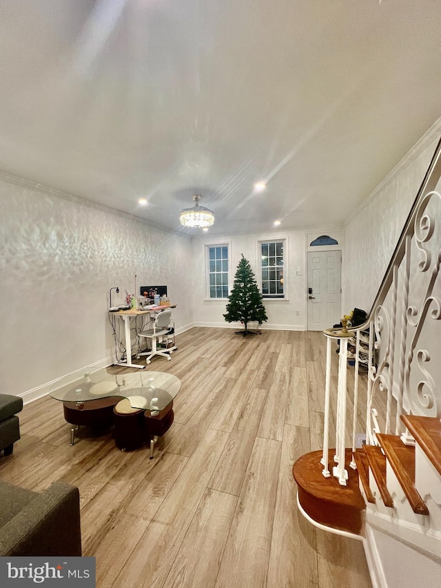 1719 S Chadwick St, Philadelphia, PA 19145 - sitting room featuring wood finished floors, stairs, a chandelier, baseboards, and ornamental molding