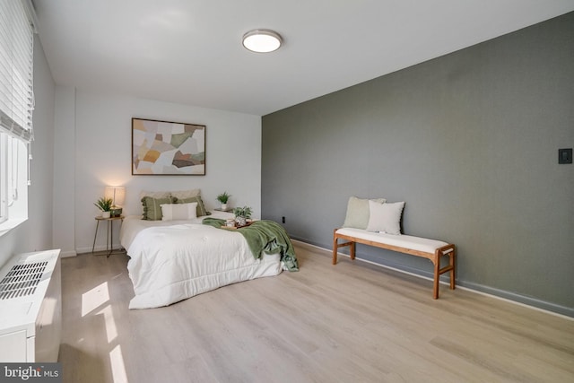 6631 Wakefield Dr Unit 209, Alexandria, VA 22307 - bedroom featuring wood finished floors and baseboards