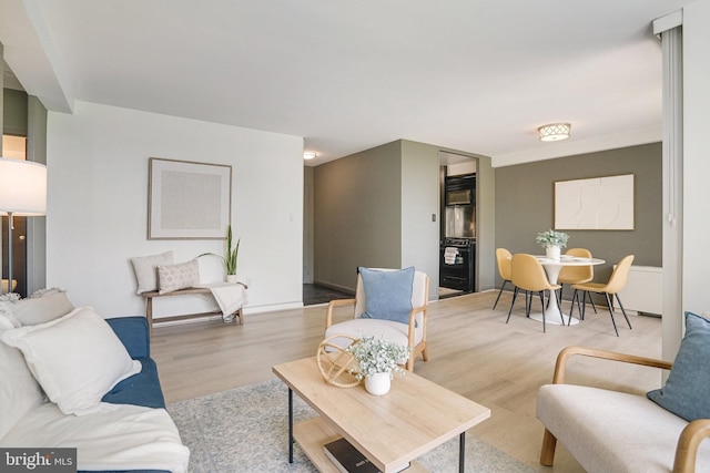 6631 Wakefield Dr Unit 209, Alexandria, VA 22307 - living area with wood finished floors
