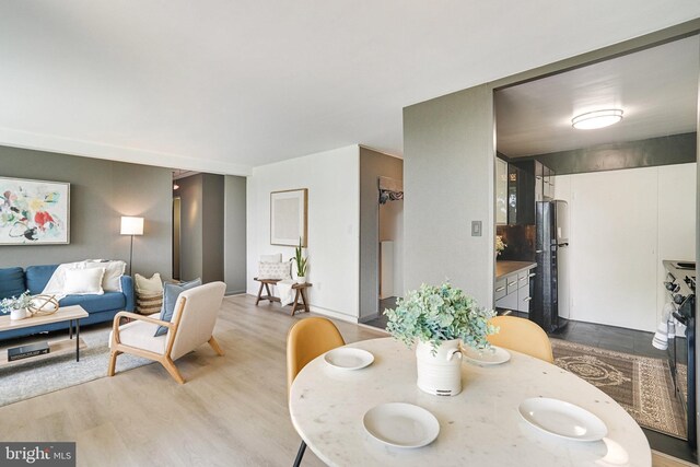 6631 Wakefield Dr Unit 209, Alexandria, VA 22307 - dining room with wood finished floors