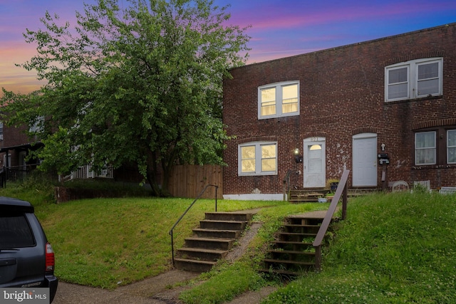 821 E Jeffrey St, Baltimore, MD 21225 - multi unit property featuring brick siding and stairway