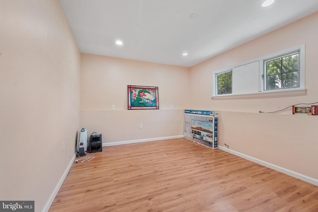 615 Kahn Dr, Baltimore, MD 21208 - spare room featuring light wood-style floors, baseboards, and recessed lighting