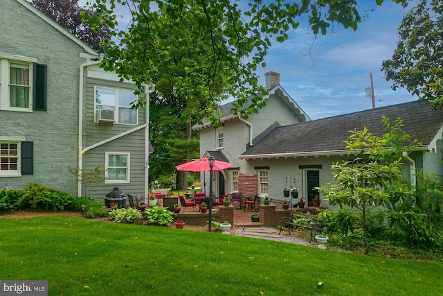 417 E Washington St, Charles Town, WV 25414 - rear view of house with a lawn, a chimney, and cooling unit
