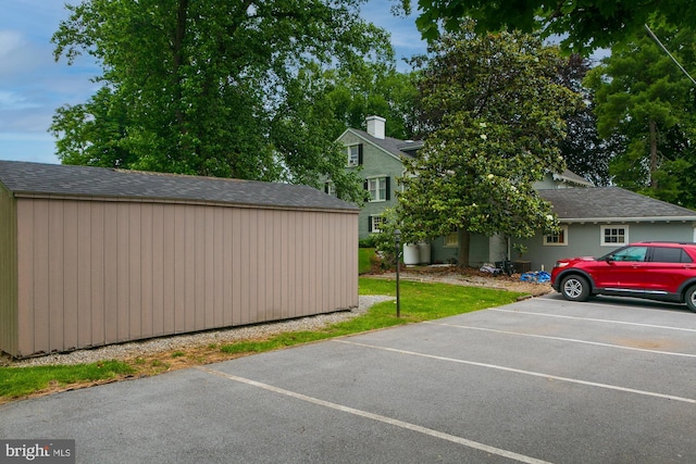 417 E Washington St, Charles Town, WV 25414 - uncovered parking lot featuring a shed