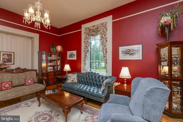 417 E Washington St, Charles Town, WV 25414 - living area featuring wood finished floors and a chandelier