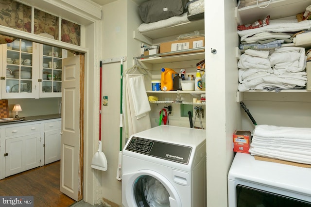 417 E Washington St, Charles Town, WV 25414 - laundry area featuring washer and clothes dryer and dark wood-type flooring