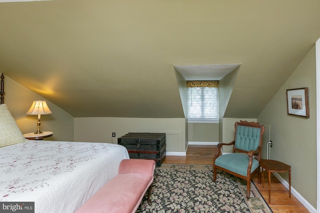 417 E Washington St, Charles Town, WV 25414 - bedroom with wood finished floors and vaulted ceiling