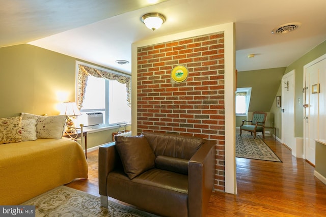417 E Washington St, Charles Town, WV 25414 - bedroom with multiple windows and wood finished floors
