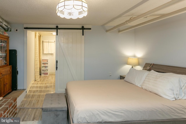 417 E Washington St, Charles Town, WV 25414 - bedroom featuring a barn door