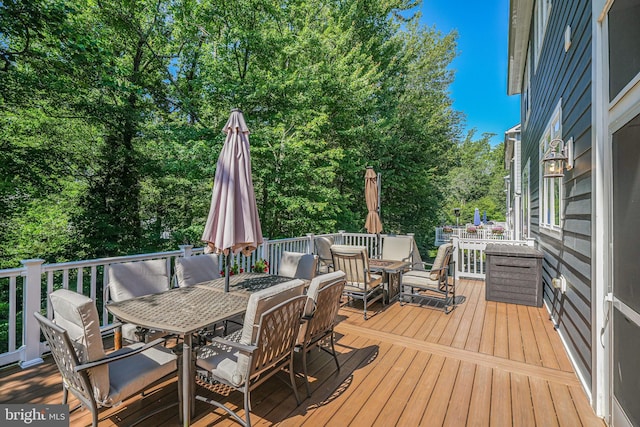 6513 Manor Ridge Ct, Falls Church, VA 22043 - deck with outdoor dining space and view of scattered trees