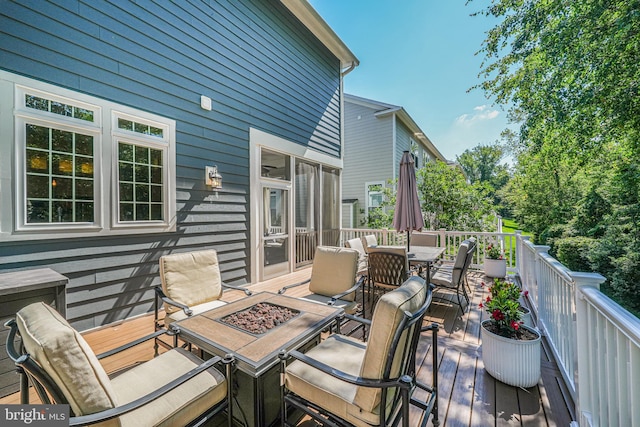 6513 Manor Ridge Ct, Falls Church, VA 22043 - wooden deck featuring outdoor dining area and a fire pit