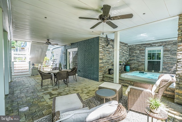 6513 Manor Ridge Ct, Falls Church, VA 22043 - view of patio / terrace with a ceiling fan, a jacuzzi, and outdoor dining area