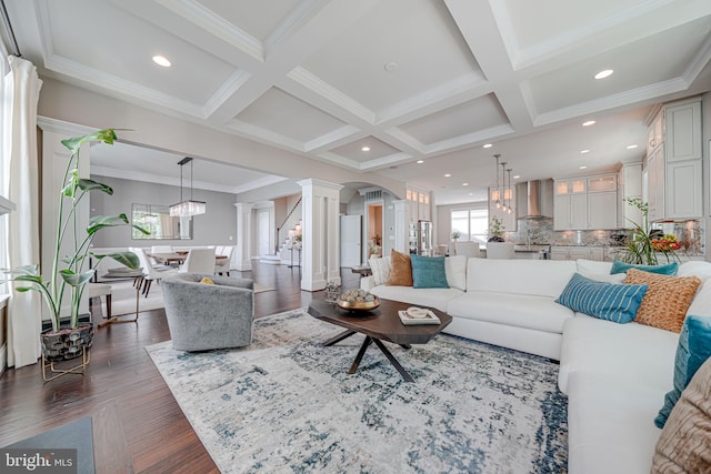 6513 Manor Ridge Ct, Falls Church, VA 22043 - living area with decorative columns, coffered ceiling, dark wood-style floors, beamed ceiling, and arched walkways