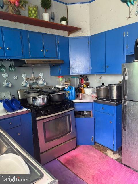 6150 Haverford Ave, Philadelphia, PA 19151 - kitchen featuring blue cabinetry, stainless steel appliances, and under cabinet range hood