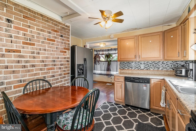 1132 State Rd, Duncannon, PA 17020 - kitchen featuring stainless steel appliances, light countertops, ceiling fan, dark wood-style flooring, and backsplash
