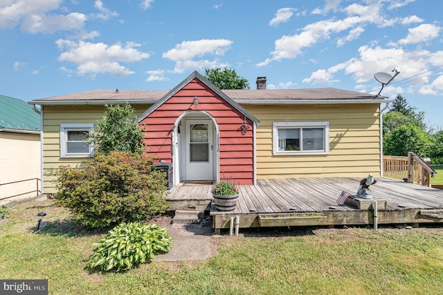 1132 State Rd, Duncannon, PA 17020 - view of front of property featuring a front lawn, a deck, and a chimney