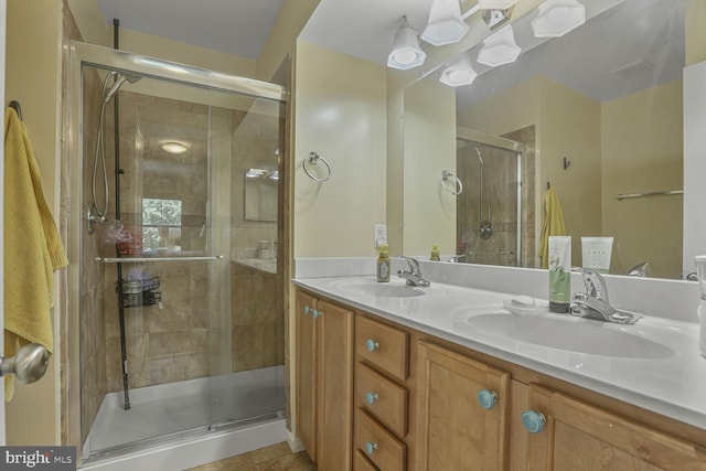 4613 Dillon St, Baltimore, MD 21224 - bathroom with a stall shower, double vanity, and tile patterned flooring