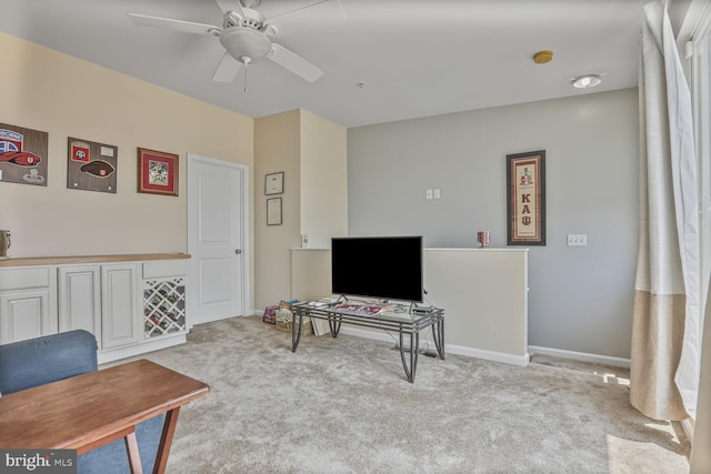4613 Dillon St, Baltimore, MD 21224 - carpeted living room with a ceiling fan and baseboards