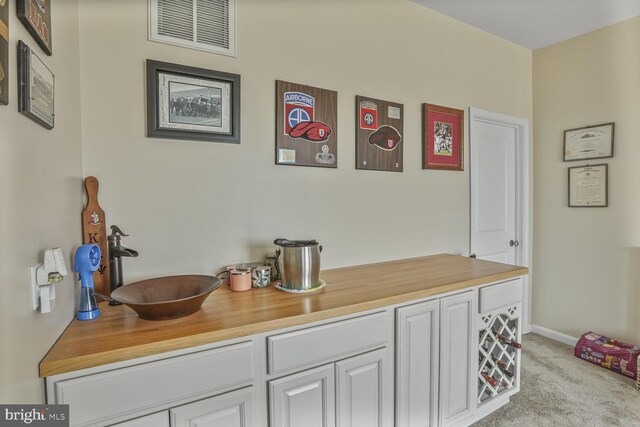 4613 Dillon St, Baltimore, MD 21224 - detailed view of a sink and carpet flooring