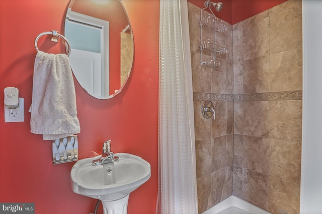 4613 Dillon St, Baltimore, MD 21224 - bathroom with a tile shower and a sink