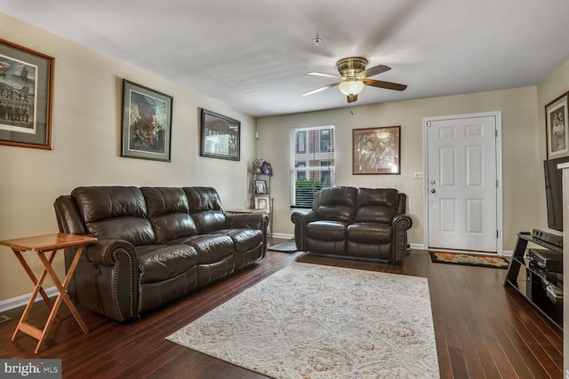 4613 Dillon St, Baltimore, MD 21224 - living room with a ceiling fan and dark wood-style floors