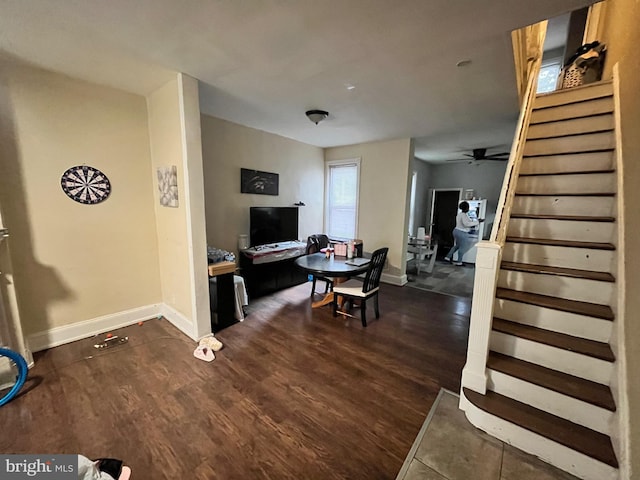 5131 Ludlow St, Philadelphia, PA 19139 - living area featuring stairs, dark wood-type flooring, baseboards, and ceiling fan