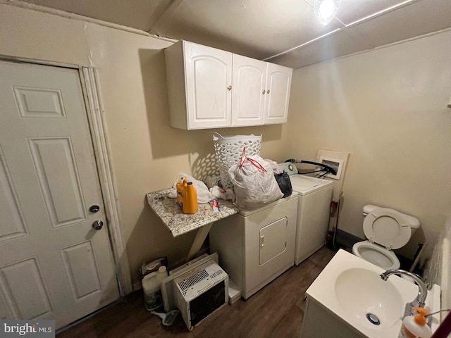 5131 Ludlow St, Philadelphia, PA 19139 - laundry room with separate washer and dryer, a sink, and dark wood-style flooring