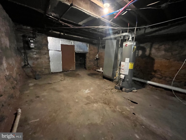 5131 Ludlow St, Philadelphia, PA 19139 - unfinished below grade area featuring gas water heater