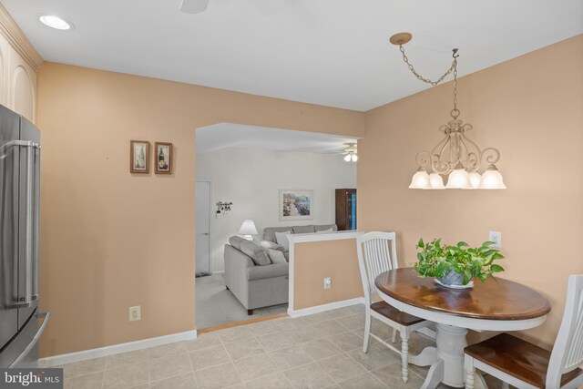 419 Saratoga Dr, Cherry Hill, NJ 08002 - dining area with a ceiling fan and a chandelier