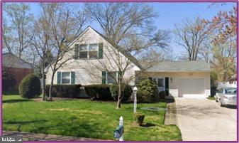 419 Saratoga Dr, Cherry Hill, NJ 08002 - view of front of property featuring a garage, driveway, and a front yard