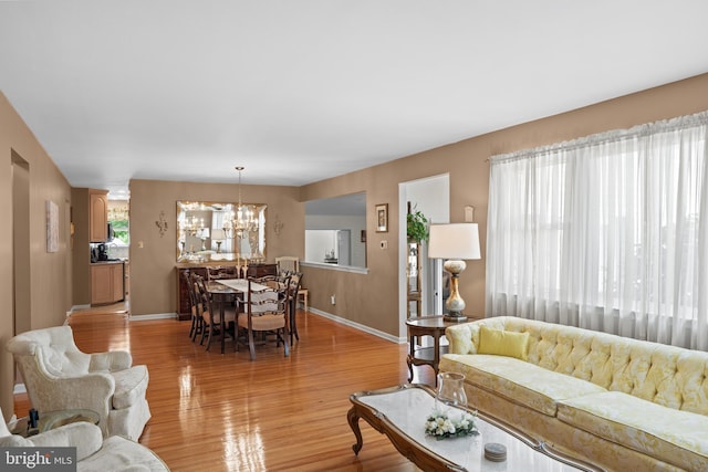 419 Saratoga Dr, Cherry Hill, NJ 08002 - living area featuring a chandelier and light wood finished floors