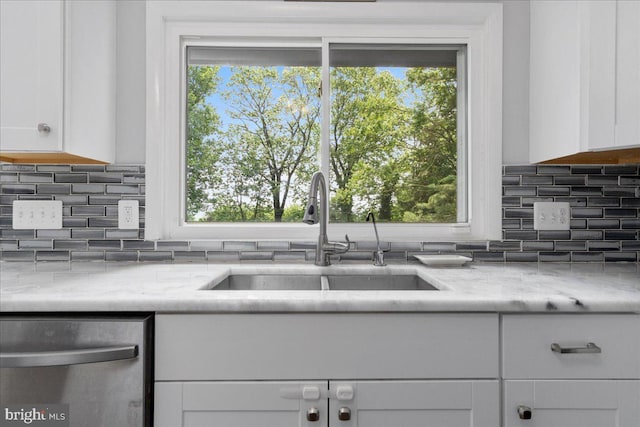11239 Putman Rd, Thurmont, MD 21788 - kitchen featuring a sink, dishwasher, white cabinets, decorative backsplash, and light stone countertops