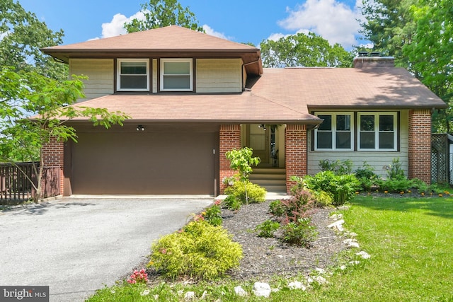 11239 Putman Rd, Thurmont, MD 21788 - view of front facade featuring brick siding, an attached garage, driveway, a shingled roof, and a chimney