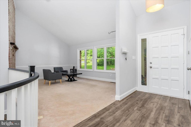 11239 Putman Rd, Thurmont, MD 21788 - entryway with high vaulted ceiling, baseboards, and wood finished floors