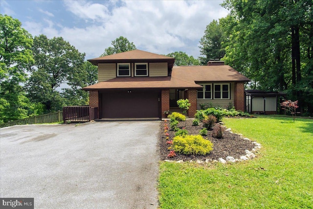 11239 Putman Rd, Thurmont, MD 21788 - view of front of home featuring driveway, an attached garage, brick siding, and a shingled roof