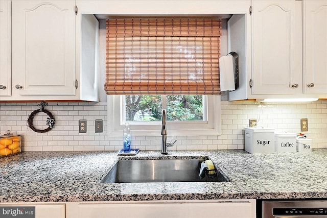 11 Thomas Cir, New Freedom, PA 17349 - kitchen featuring tasteful backsplash, white cabinets, and light stone counters