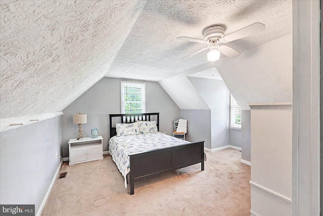 11 Thomas Cir, New Freedom, PA 17349 - bedroom featuring a textured ceiling, light colored carpet, lofted ceiling, and ceiling fan