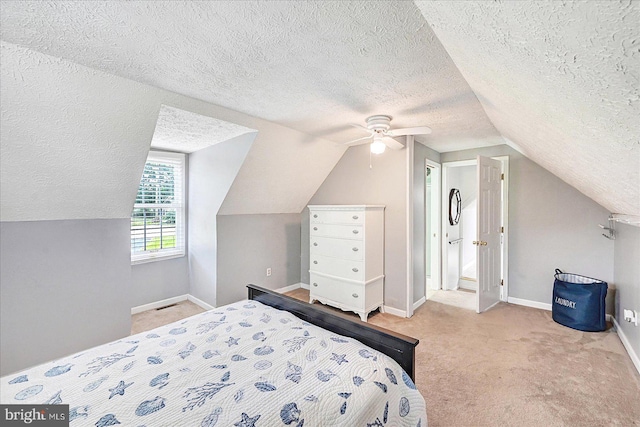 11 Thomas Cir, New Freedom, PA 17349 - carpeted bedroom featuring a textured ceiling, lofted ceiling, and a ceiling fan
