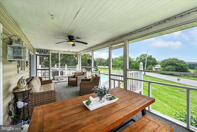 11 Thomas Cir, New Freedom, PA 17349 - sunroom with ceiling fan and outdoor dining area