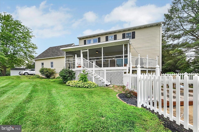11 Thomas Cir, New Freedom, PA 17349 - rear view of property featuring a sunroom, stairway, and a ceiling fan
