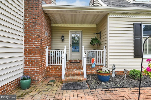 11 Thomas Cir, New Freedom, PA 17349 - entrance to property featuring roof with shingles and covered porch