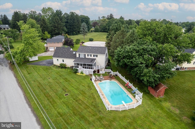 11 Thomas Cir, New Freedom, PA 17349 - view of subject property with a pool area and a tree filled landscape